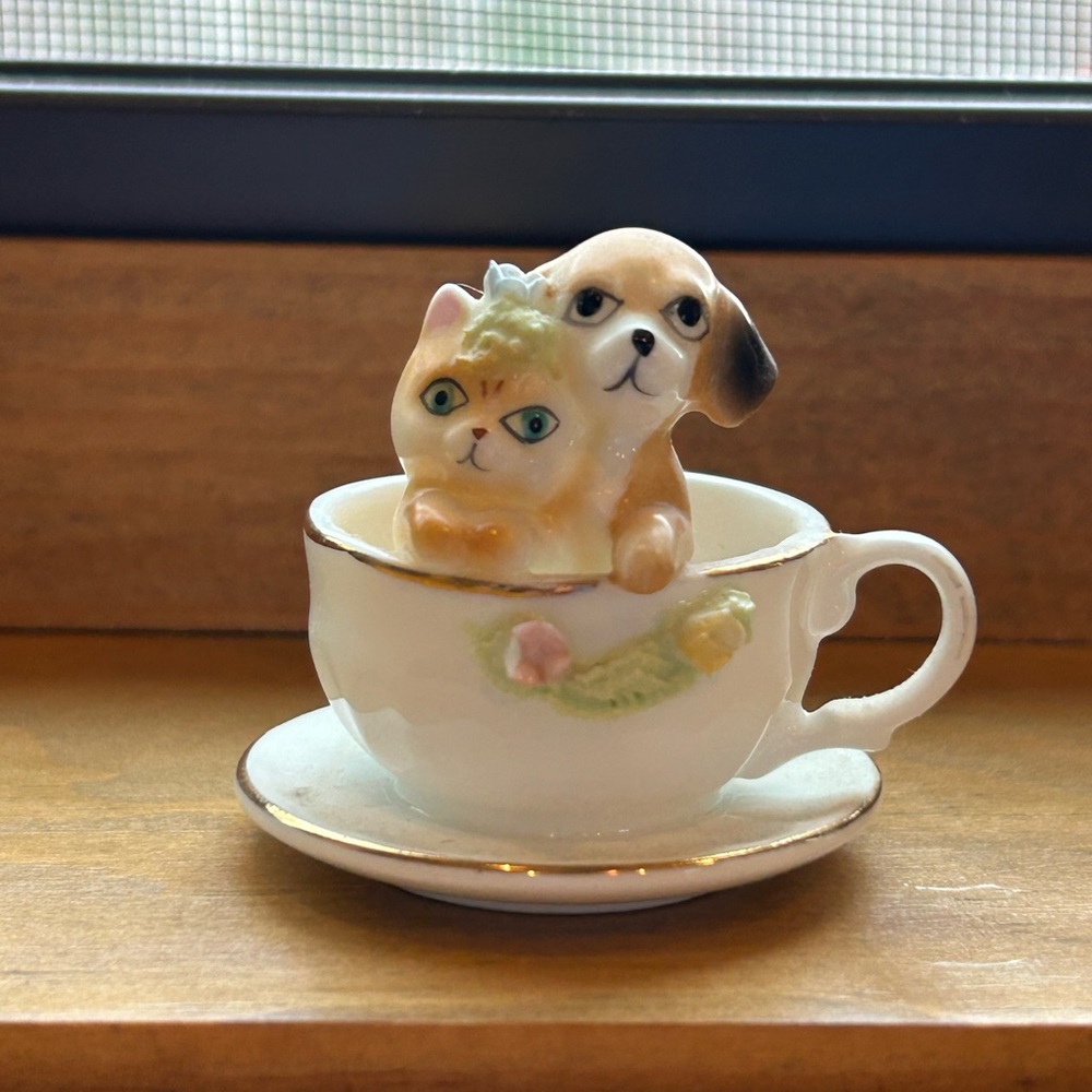 Napcoware dog in teacup with cat bone china
